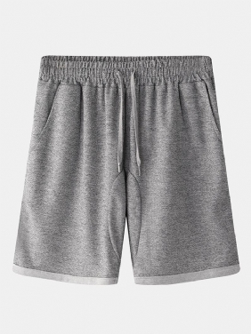 Menn Løs Fritids Hjem Solid Farge Elastisk Midje Snøring Pocket Sports Shorts