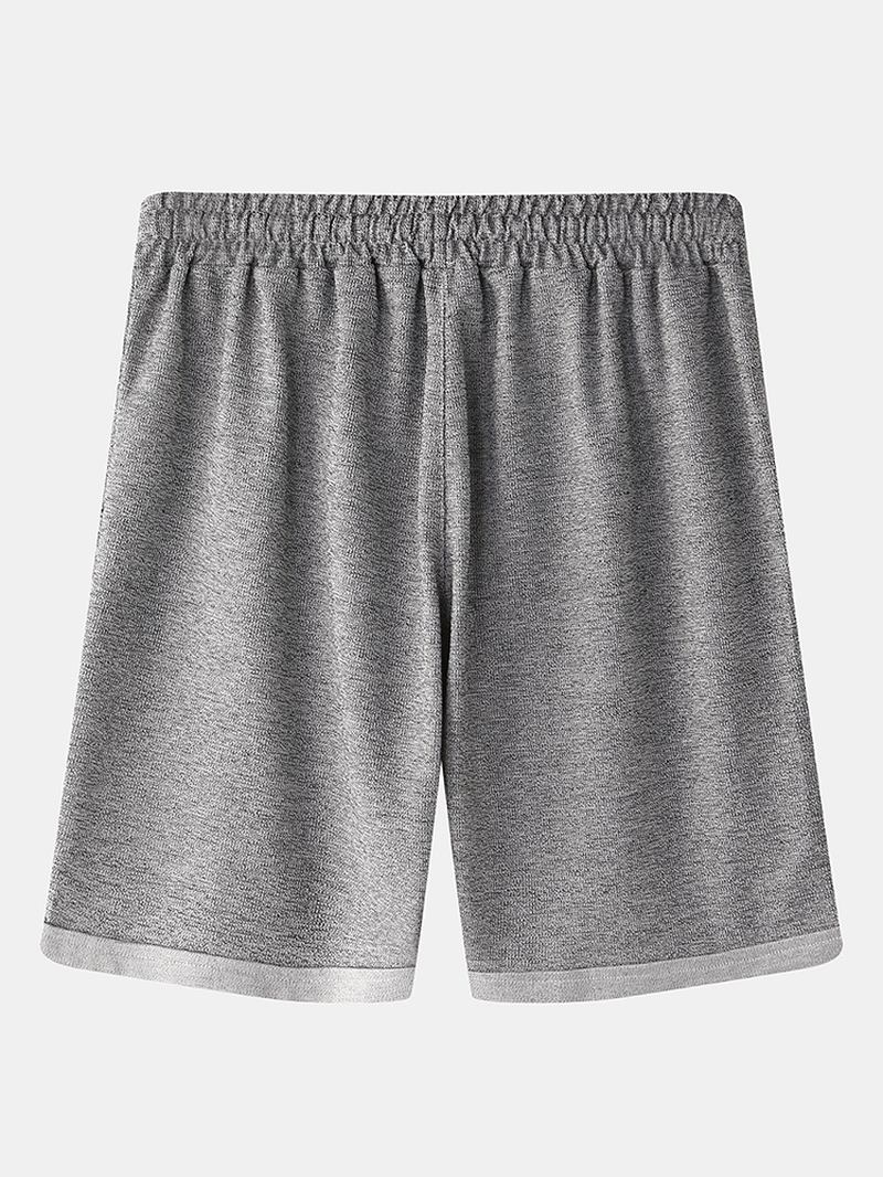 Menn Løs Fritids Hjem Solid Farge Elastisk Midje Snøring Pocket Sports Shorts